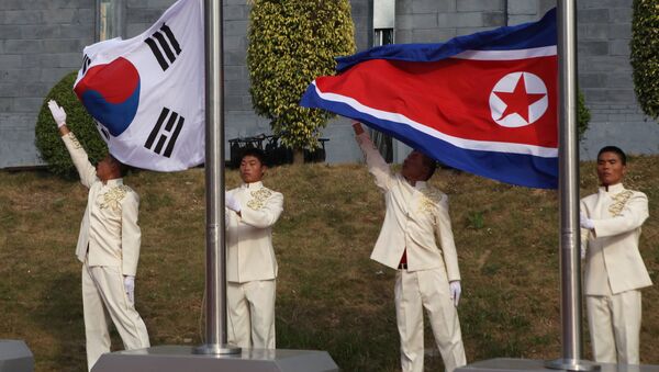 Banderas de Corea del Sur y Corea del Norte - Sputnik Mundo