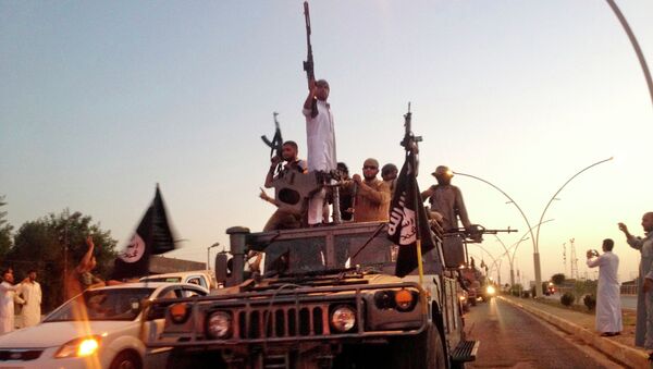 Milicianos del grupo yihadista Estado Islámico - Sputnik Mundo