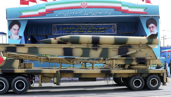 In this Saturday, April 18, 2015 file photo, a missile is displayed by the Iranian army in front of a portrait of supreme leader Ayatollah Ali Khamenei during a parade marking National Army Day at the mausoleum of the late revolutionary founder Ayatollah Khomeini, just outside Tehran, Iran. - Sputnik Mundo
