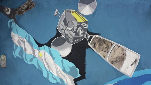 Mural pintado en Buenos Aires con motivo del lanzamiento en 2014 del satélite ARSAT-1 - Sputnik Mundo