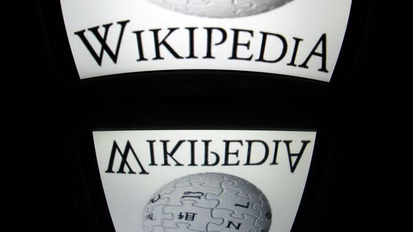 The Wikipedia logo is seen on a tablet screen on December 4, 2012 in Paris - Sputnik Mundo
