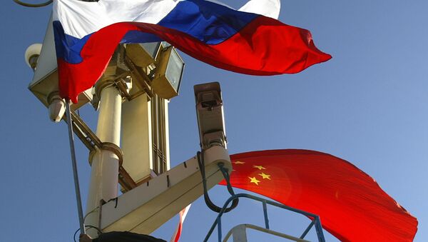 Banderas de Rusia y China - Sputnik Mundo