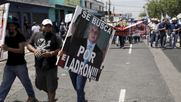 Students of San Carlos University participate in a demonstration demanding the resignation of Guatemalan President Otto Perez Molina in Guatemala City Students of San Carlos University participate in a demonstration demanding the resignation of Guatemalan President Otto Perez Molina in Guatemala City - Sputnik Mundo