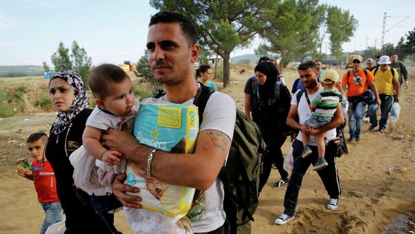 La crisis migratoria es producto de la política de Occidente, según politólogo - Sputnik Mundo