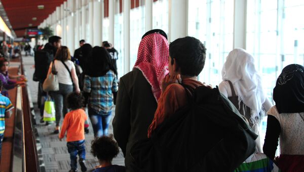 Refugiados sirios en el aeropuerto de Buenos Aires - Sputnik Mundo