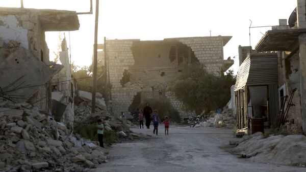 Edificios destruidos en Idlib (archivo) - Sputnik Mundo