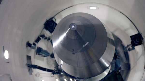 An inert Minuteman 3 missile is seen in a training launch tube at Minot Air Force Base, N.D.  - Sputnik Mundo