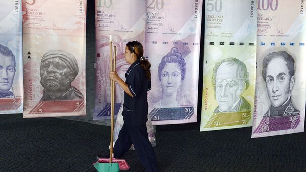 Banderas que retratan la divisa venezolana en Banco Central de Venezuela - Sputnik Mundo
