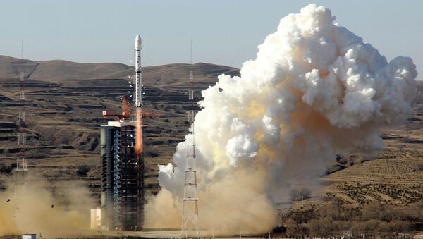 A Long March-4B rocket loaded with the CBERS-4 satellite - Sputnik Mundo
