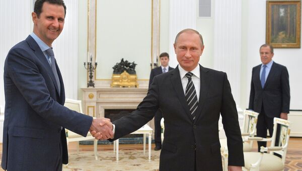 Presidente de Siria, Bashar Asad, y presidente de Rusia, Vladímir Putin, durante el encuentro en el Kremlin, el 21 de octubre, 2015 - Sputnik Mundo