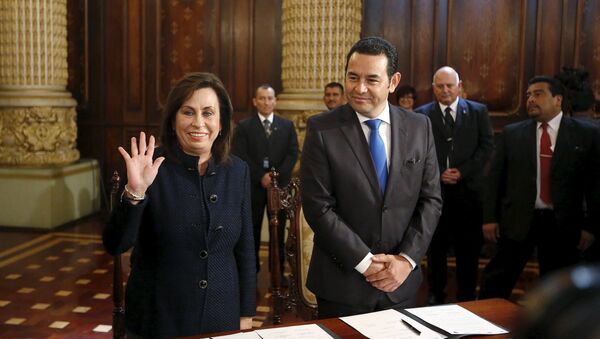 Candidatos presidenciales de Guatemala Sandra Torres y Jimmy Morales - Sputnik Mundo