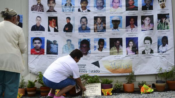 Fotos de los desaparecidos en Colombia - Sputnik Mundo