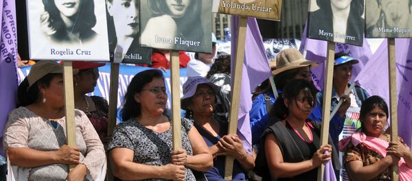 Una manifestación en contra de los feminicidios en América Latina en Guatemala (archivo) Una manifestación en contra de los feminicidios en América Latina en Guatemala (archivo) - Sputnik Mundo