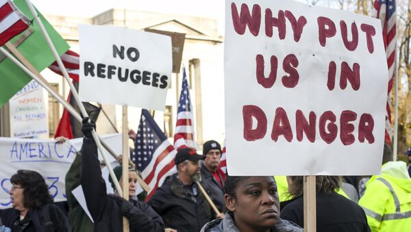 Protesta contra los refugiados en los EEUU - Sputnik Mundo