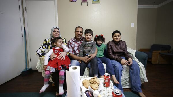 Una familia de refugiados en Texas - Sputnik Mundo