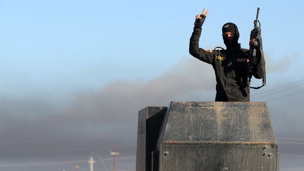 Miembro de las Fuerzas antiterroristas iraquíes en Ramadi - Sputnik Mundo