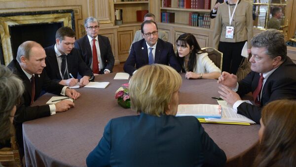 Angela Merkel, Vladímir Putin, Francois Hollande y Petró Poroshenko durante la cumbre del Cuarteto de Normandía (archivo) - Sputnik Mundo
