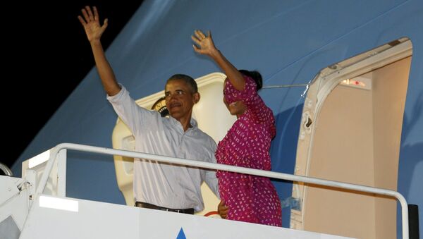 Barack Obama, presidente de EEUU, con la primera dama Michelle Obama - Sputnik Mundo