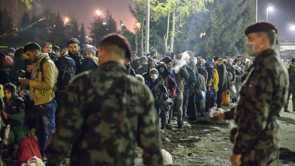 Refugiados en la frontera entre Austria y Slovenia - Sputnik Mundo