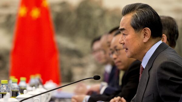 Wang Yi, ministro de Exteriores de China - Sputnik Mundo