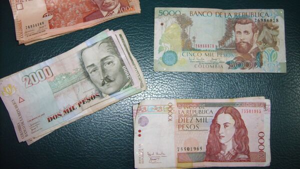 Pesos colombianos - Sputnik Mundo