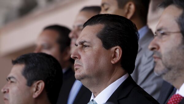 Presidente de Honduras, Juan Orlando Hernández y los miembros de la MACCIH en una rueda de prensa en Tegucigalpa - Sputnik Mundo