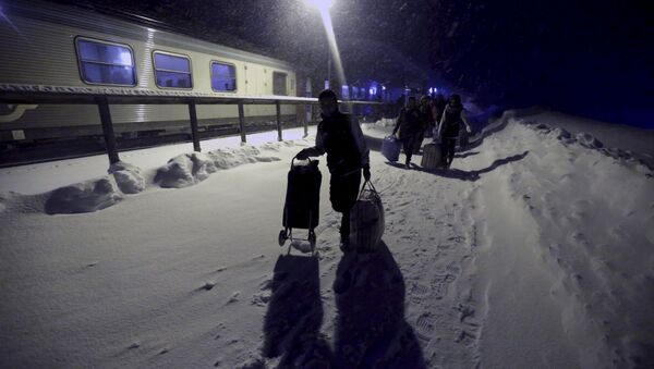 Refugiados en Finlandia (archivo) - Sputnik Mundo