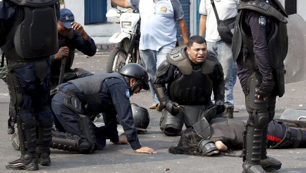 Mueren dos policías durante protesta en Venezuela - Sputnik Mundo