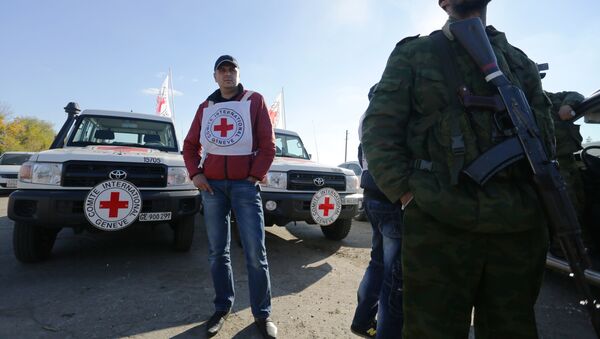 Un representante de la Cruz Roja en Lugansk - Sputnik Mundo