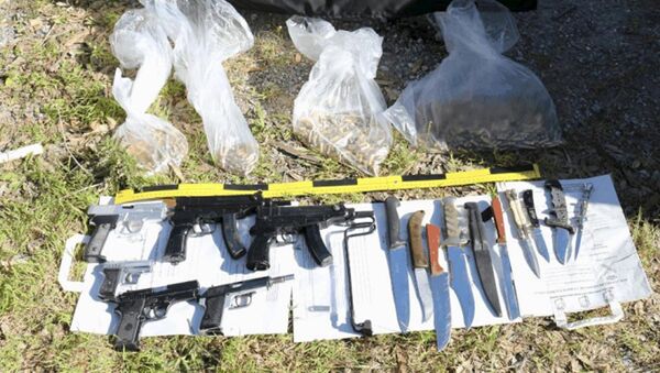 Las armas y la bandera de Daesh halladas por la policía en Ceuta, España - Sputnik Mundo