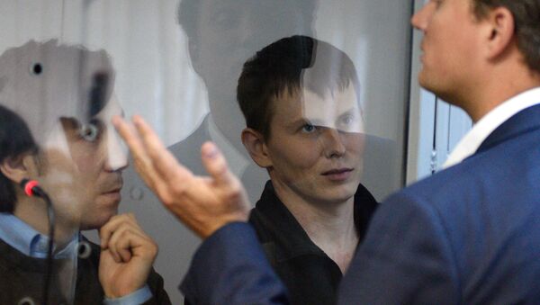 Ciudadanos rusos, Evgueni Eroféev y Alexandr Alexándrov, durante el proceso penal - Sputnik Mundo
