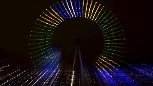 London Eye ('Ojo de Londres'), iluminado en homenaje a los 100 días que faltan para el inicio de los Juegos Olímpicos de Río 2016 - Sputnik Mundo