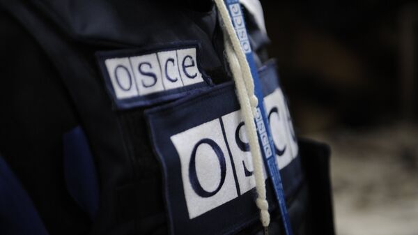 Un representante de la OSCE en Donbás (archivo) - Sputnik Mundo