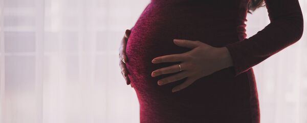 Una mujer embarazada (archivo) Una mujer embarazada (archivo) - Sputnik Mundo