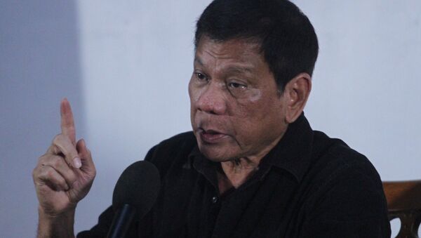 El nuevo presidente de Filipinas, Rodrigo Duterte, durante la rueda de prensa en Davao - Sputnik Mundo