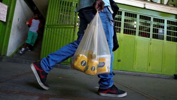 Venezolanos comen tres veces al día o más, según funcionario - Sputnik Mundo