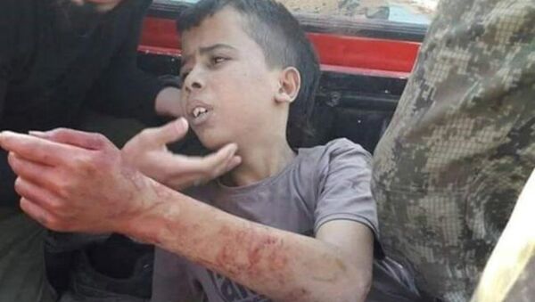 El niño ejecutado por los rebeldes sirios - Sputnik Mundo