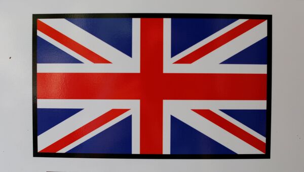 La imagen de la bandera del Reino Unido en una casa de cambio  en Sevilla - Sputnik Mundo