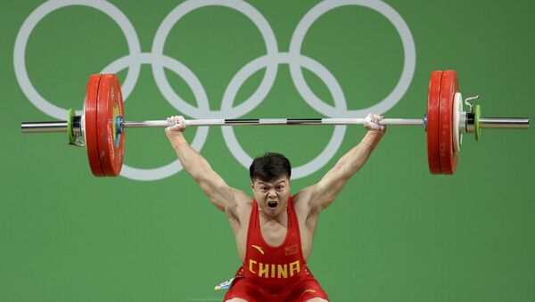 Long Qingquan, atleta de China - Sputnik Mundo