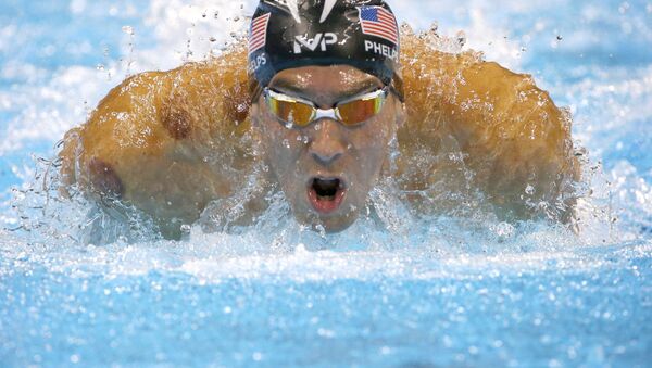 El nadador estadounidense Michael Phelps durante la semifinal de los 200 metros mariposa en los JJOO 2016 - Sputnik Mundo