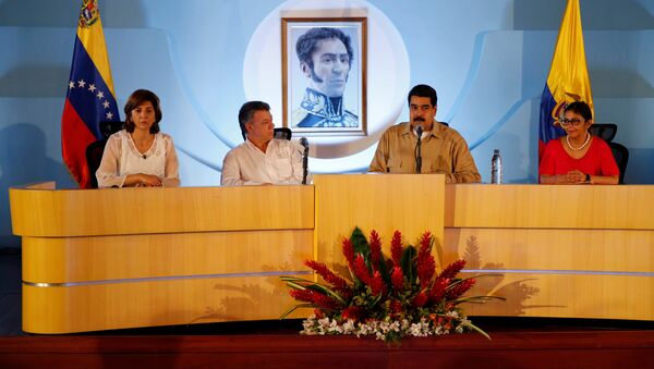 María Ángela Holguín, Juan Manuel Santos, Nicolás Maduro y Delcy Rodríguez - Sputnik Mundo