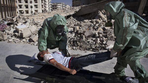 Voluntarios practican respuesta a un ataque químico, Alepo, Siria - Sputnik Mundo