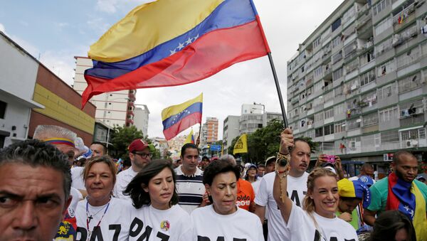 Una marcha de la oposición en Caracas, Venezuela - Sputnik Mundo