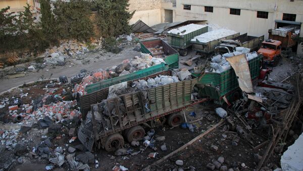 Un convoy humanitario de la ONU destruido en un bombardeo en Siria, el 19 de septiembre - Sputnik Mundo
