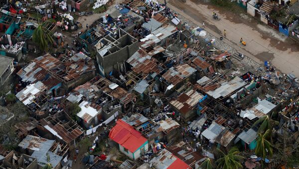 Consecuencias del paso del huracán Matthew por Haití - Sputnik Mundo