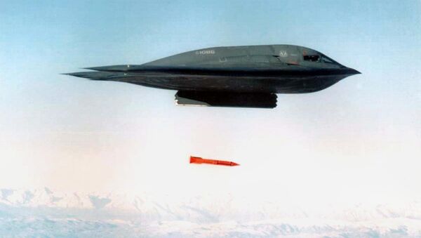 An undated file picture shows a B-2 Spirit Bomber droping a B61-11 bomb casing from an undisclosed location - Sputnik Mundo