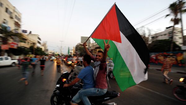 Los palestinos en la ciudad de Gaza - Sputnik Mundo