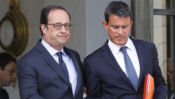 Francois Hollande y Manuel Valls - Sputnik Mundo