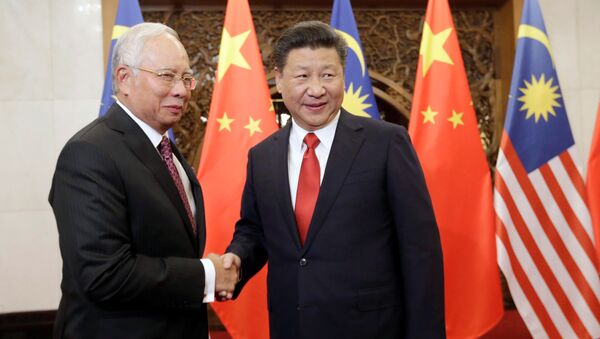 El primer ministro de Malasia, Najib Razak, y el presidente de China, Xi Jinping - Sputnik Mundo