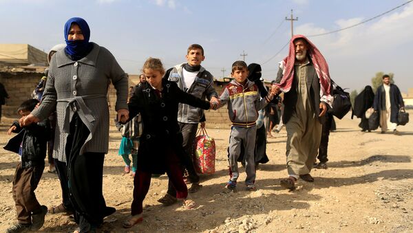 Civiles huyen de Mosul - Sputnik Mundo